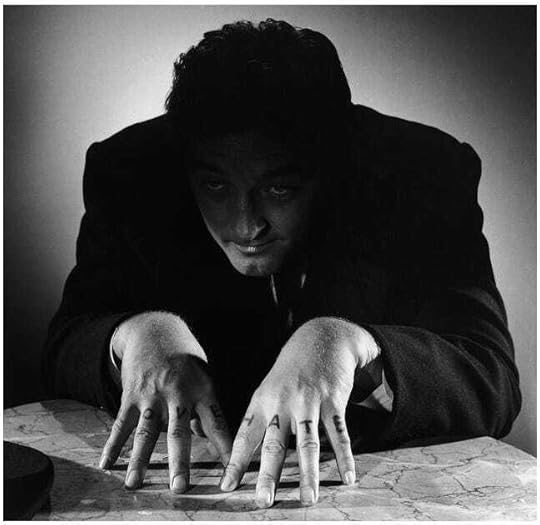 Promo portrait of Robert Mitchum for