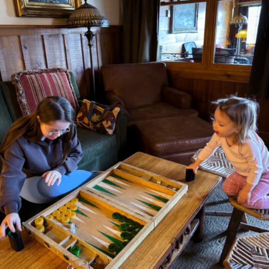 Penny and her little niece play Backgammon