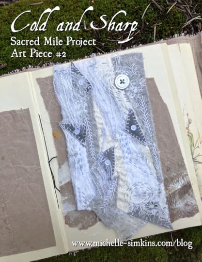 Hand embroidered art in shades of gray and white in an art journal