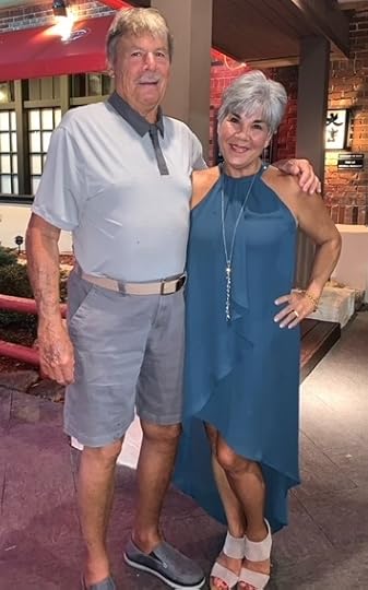 Husband and wife standing together