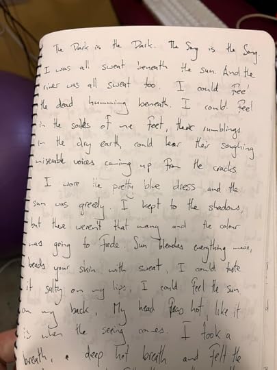 Page of a notebook, starting with the words - The Dark is the Dark.