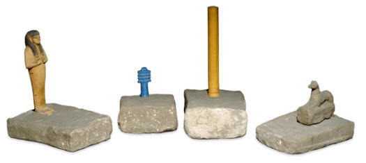 A set of the magical bricks with the amuletic figures atop them