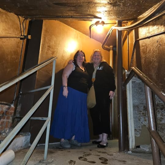 Veronnica and Eva pose together on the steps just inside Al Capone's secret tunnel.
