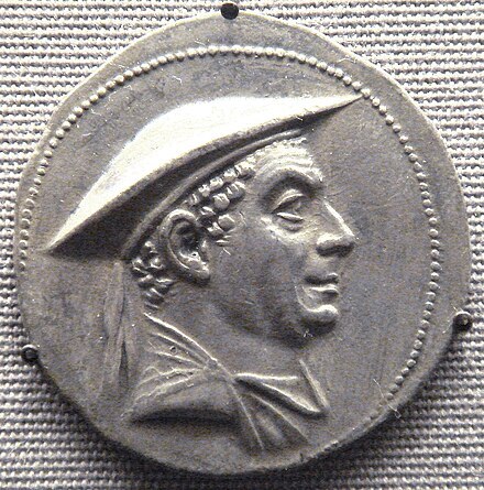 Portrait of Antimachos I as stamped on coin. Many times the book mentions that Heliokleia had a mocking smile similar to Antimachos as she was a descendant of Antimachos the God. When I look at the portrait, now I understand why Bradshaw explained the smile as mocking because it does look as if Antimachos was rather amused.