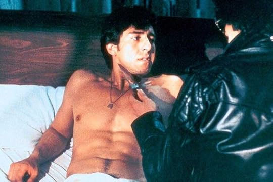 Larry Atlas holds a knife to the throat of Arnoldo Santana in Cruising (1980)