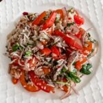 The plated Steak and Tomato salad
