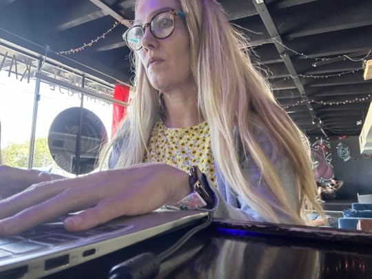 debut author working on book at kava bar