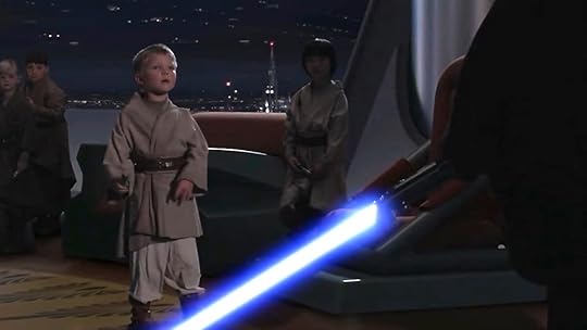 A scared Youngling reacts to Anakin's blue lightsaber in Revenge of the Sith