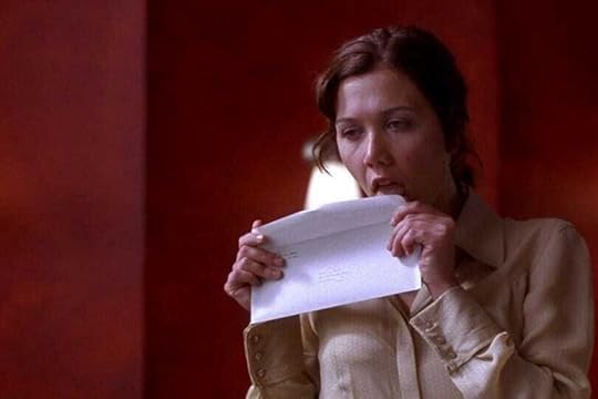 Maggie Gyllenhaal licks an envelope in