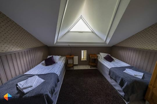 Hullu Poro Apartment Bedroom with two single beds - Levi, Lapland, Finland.