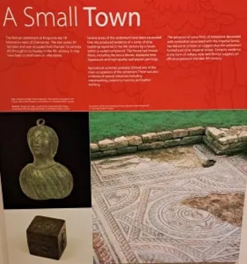 Signboard explaining the origins of Roman Corinium and showing pictures of a mosaic and other artefacts