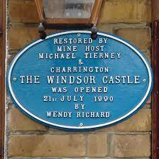Blue plaque announcing the opening of the Windsor Castle by Wendy Richard