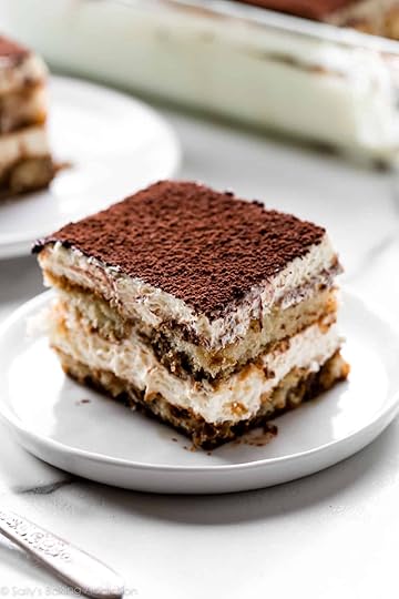 Slice of tiramisu on white plate