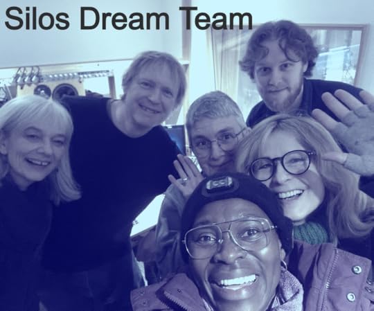 Photo of the production team for Silos, smiling at camera