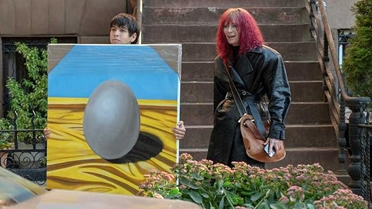 Julio Torres holds an oil painting of an egg next to Tilda Swinton in