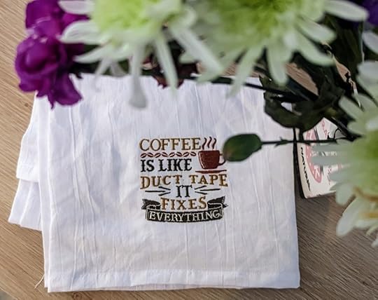 Tea towel with embroidery that reads Coffee is like duct tape, it fixes everything. Iris Basin Homestead