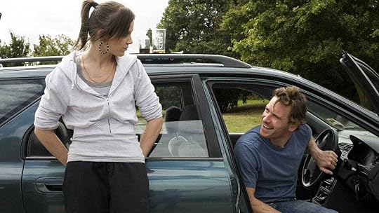 Katie Jarvis looks down at Michael Fassbender in