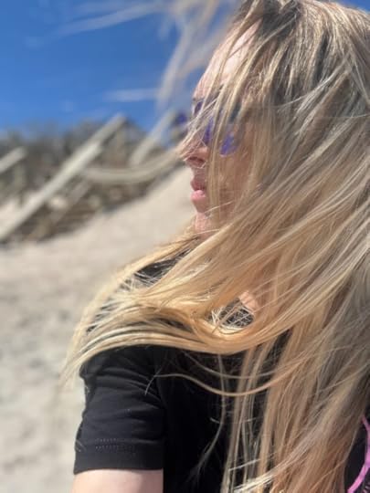 melbourne beach, windy, wind swept hair, woman at beach