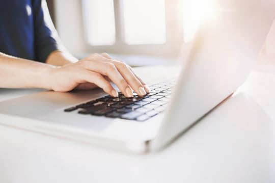 woman typing laptop