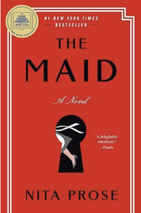 Book cover for The Maid by Nita Prose. Read cover with a key hole that shows an image of a maid's leg.