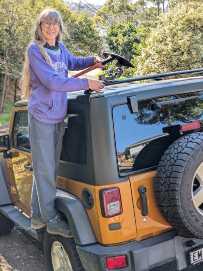 Loading a shovel onto my Jeep - need to stand on the wheel to get up there