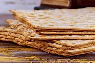 a pile of seven unleavened flat bread (matzah)