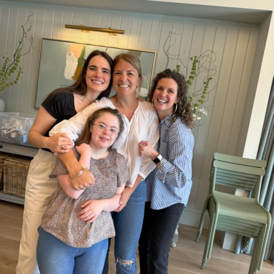 Penny and a group of friends from Hope Heals give each other a group hug