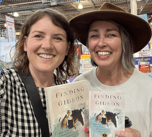 author Sarah Hickner poses with a reader at the Ohio Equine Affair