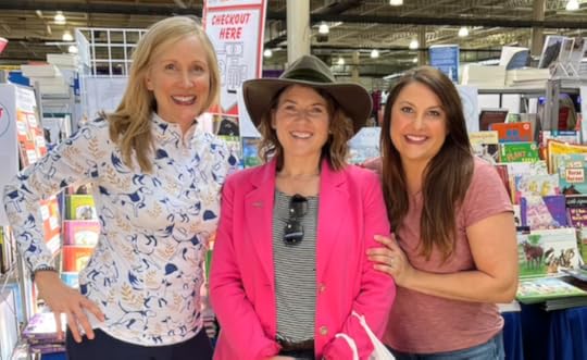 Equestrian authors Susan Friedland, Sarah Welk Baynum, and Sarah Hickner pose for a photo together at the Ohio Equine Affair