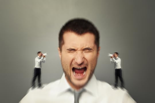 A man screaming in frustration because he has a tiny man on each shoulder with a bullhorn competing to get his attention.