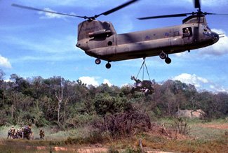 The CH-47 Chinook is a multipurpose helicopter that was often used to sling load heavy weapons, cargo, fuel in rubber tanks, and all sorts of military equipment. Photo courtesy of the author.