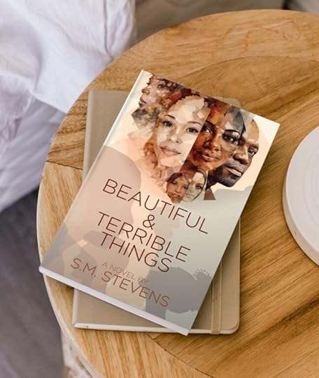 book Beautiful and Terrible Things on a wooden bedside table