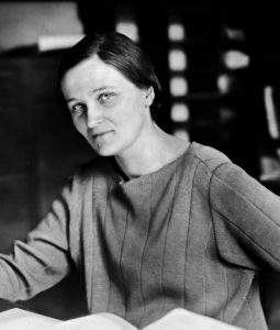 B/W portrait of Cecilia Payne-Gaposchkin sitting at a desk
