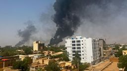 TOPSHOT - Smoke billows above residential buildings in Khartoum on April 16, 2023, as fighting in Sudan raged for a second day in battles between rival generals. Violence erupted early on April 15 after weeks of deepening tensions between army chief Abdel Fattah al-Burhan and his deputy, Mohamed Hamdan Daglo, commander of the heavily-armed paramilitary Rapid Support Forces (RSF), with each accusing the other of starting the fight. (Photo by AFP) (Photo by -/AFP via Getty Images)