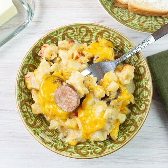 Kielbasa Breakfast Casserole in a bowl served with toast and juice.