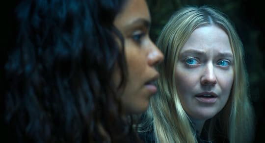Georgina Campbell, left, and Dakota Fanning appear in a scene from