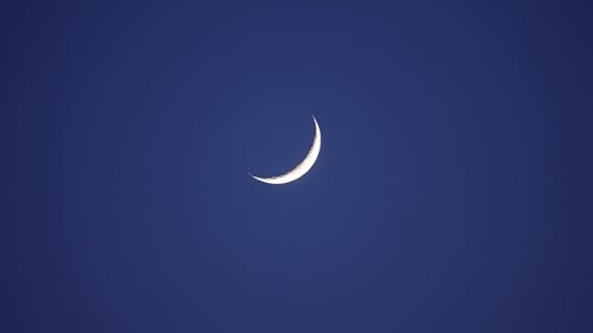 New crescent moon on a blue bakcground
