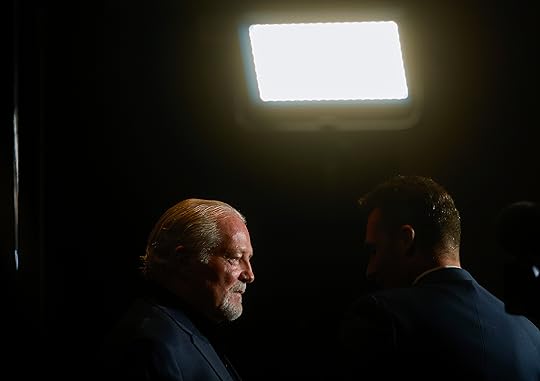 Brian Sabean talks to members of the media before the...