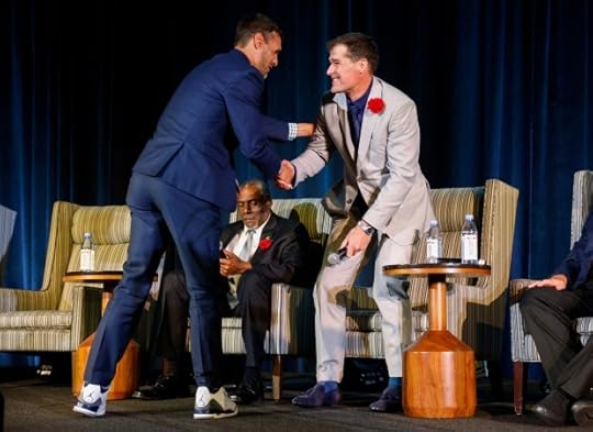 Bay Area Sports Hall of Fame inductees Chris Wondolowski, left, shakes hands with Patrick Marleau during a panel at the Hyatt Regency in San Francisco, Calif., on Monday, May 6, 2024. (Nhat V. Meyer/Bay Area News Group)