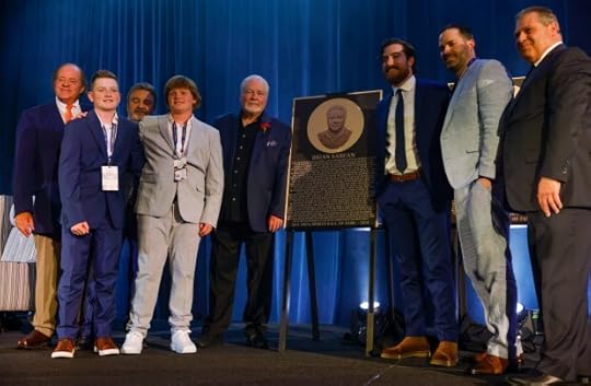 Bay Area Sports Hall of Fame inductee Brian Sabean, center, poses next to his plaque with supporters, including his four sons, Chris Berman and Ned Coletti at the Hyatt Regency in San Francisco, Calif., on Monday, May 6, 2024. (Nhat V. Meyer/Bay Area News Group)