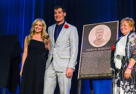 Bay Area Sports Hall of Fame inductee Patrick Marleau poses for a photograph next to his plaque with his wife Christina after she introduced him during the ceremony at the Hyatt Regency in San Francisco, Calif., on Monday, May 6, 2024. (Nhat V. Meyer/Bay Area News Group)
