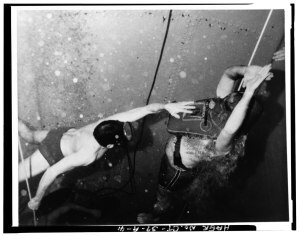 Inside the dive town photo of Navy submariner practicing his escape.