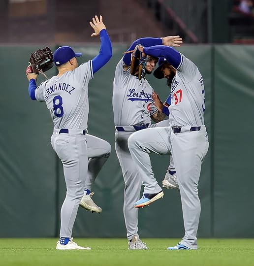 Los Angeles Dodgers outfielders Enrique Hernández, #8 Andy Pages #44...