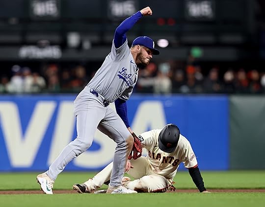 Los Angeles Dodgers second baseman Gavin Lux #9 celebrates turning...