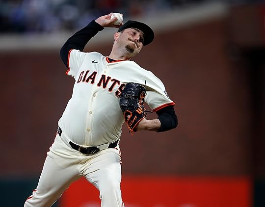 San Francisco Giants relief pitcher Luke Jackson #77 throws against...