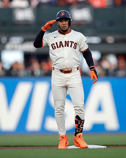 San Francisco Giants’ Thairo Estrada #39 reacts after hitting a...