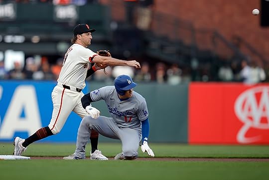 San Francisco Giants shortstop Casey Schmitt #10 forces out Los...