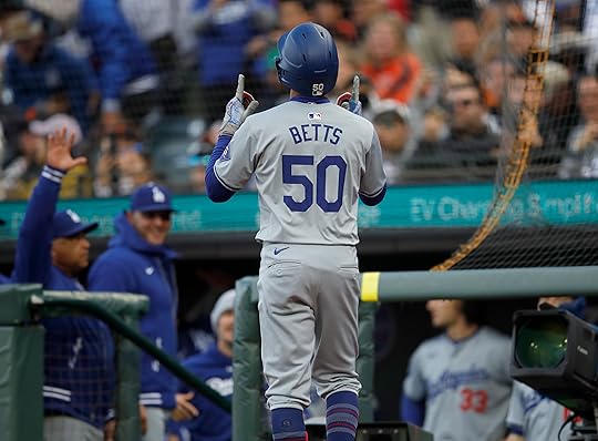 Los Angeles Dodgers’ Mookie Betts #50 celebrates his solo home...