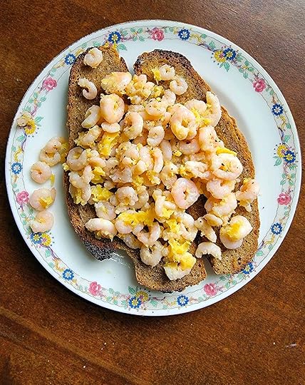 British potted shrimp on slices of rye toast.