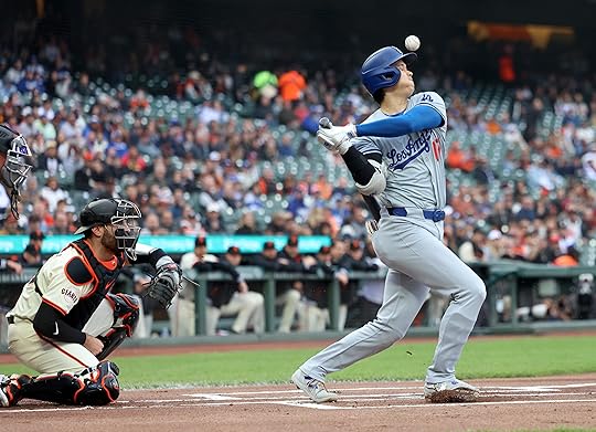Los Angeles Dodgers’ Shohei Ohtani (17) swings for a foul...